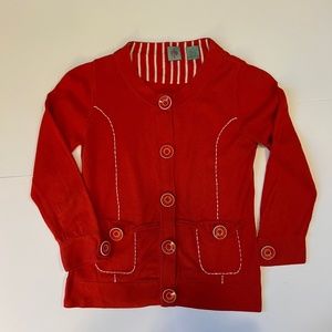 Unique red vintagey top with oversized statement buttons and contrast stitching